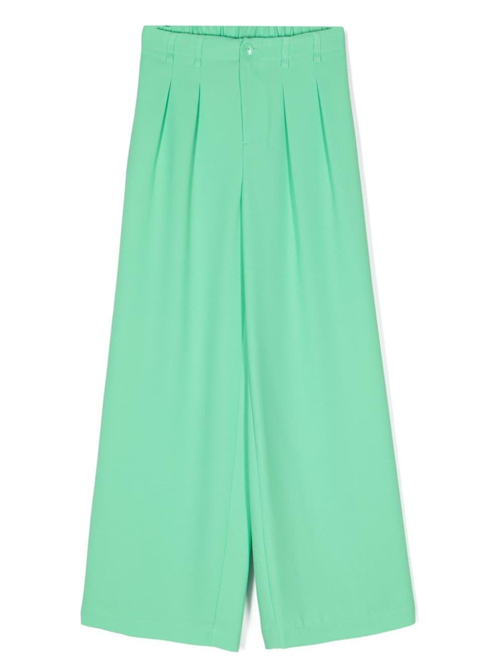 Green crepe trousers for girls