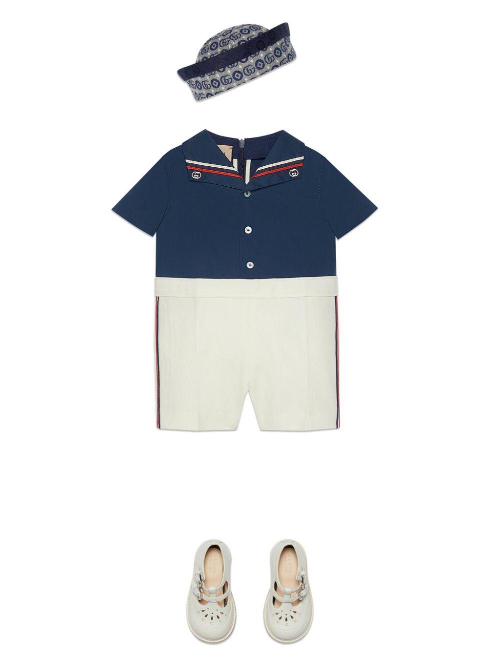 White and blue romper for newborns with logo