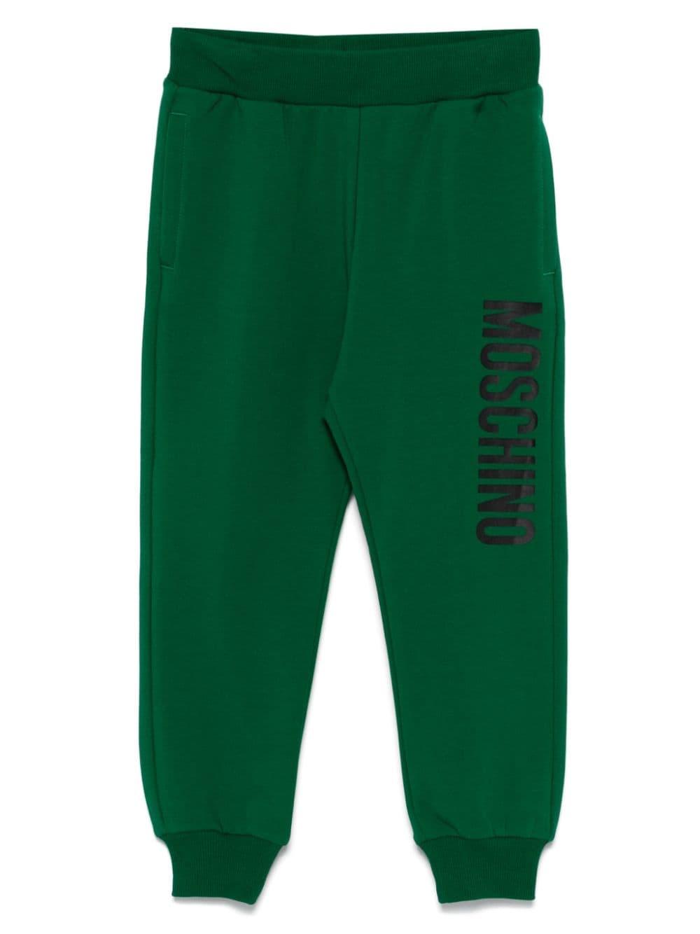 Emerald green trousers for children with logo