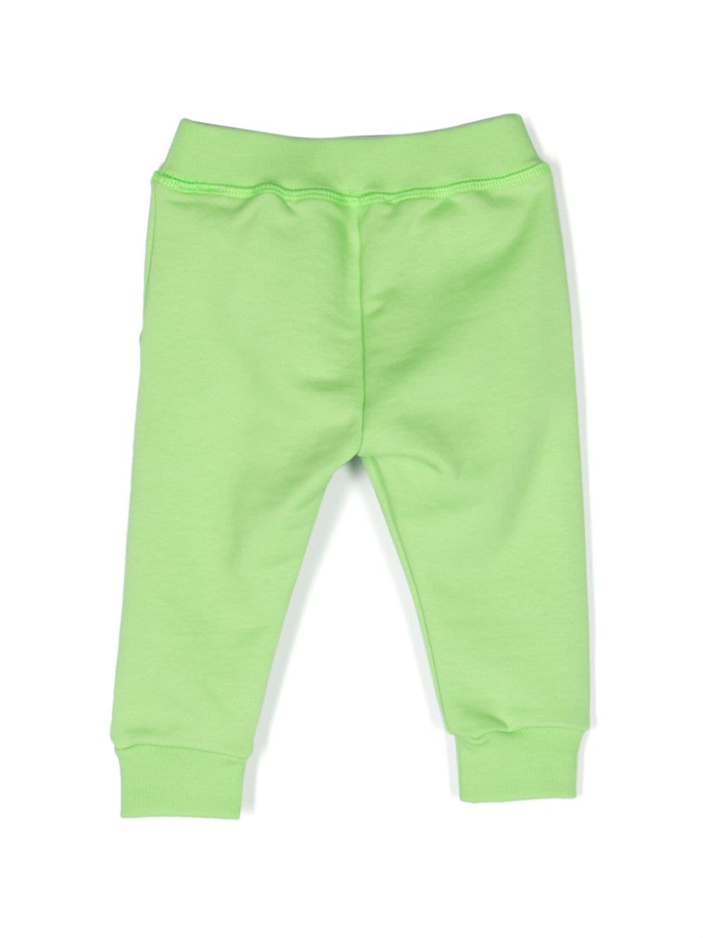 Fluorescent green sports trousers for newborns