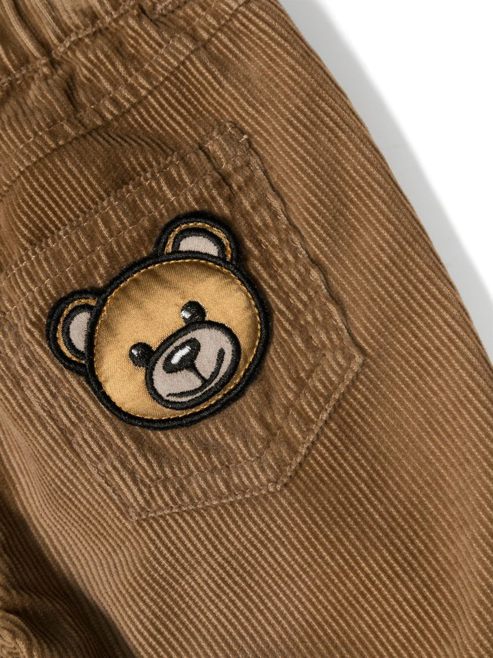 Brown baby trousers with logo