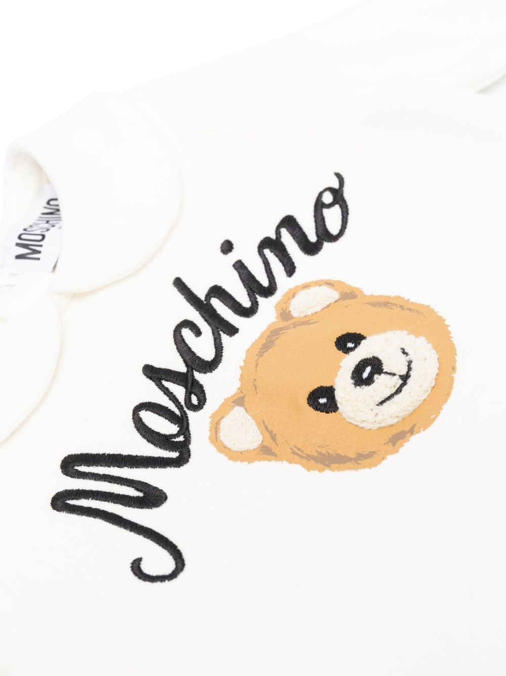 White onesie set for newborns with logo