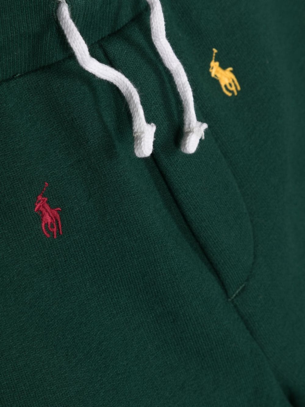 Pantalone sportivo verde per bambino con logo