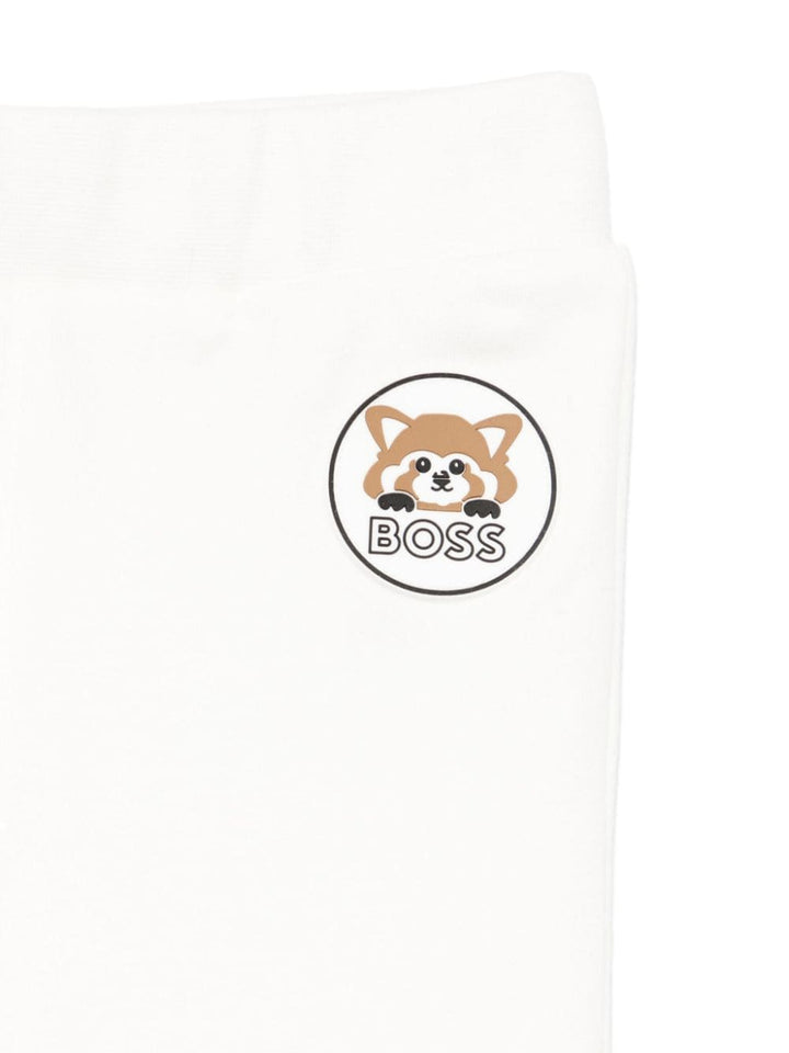 White baby outfit with logo