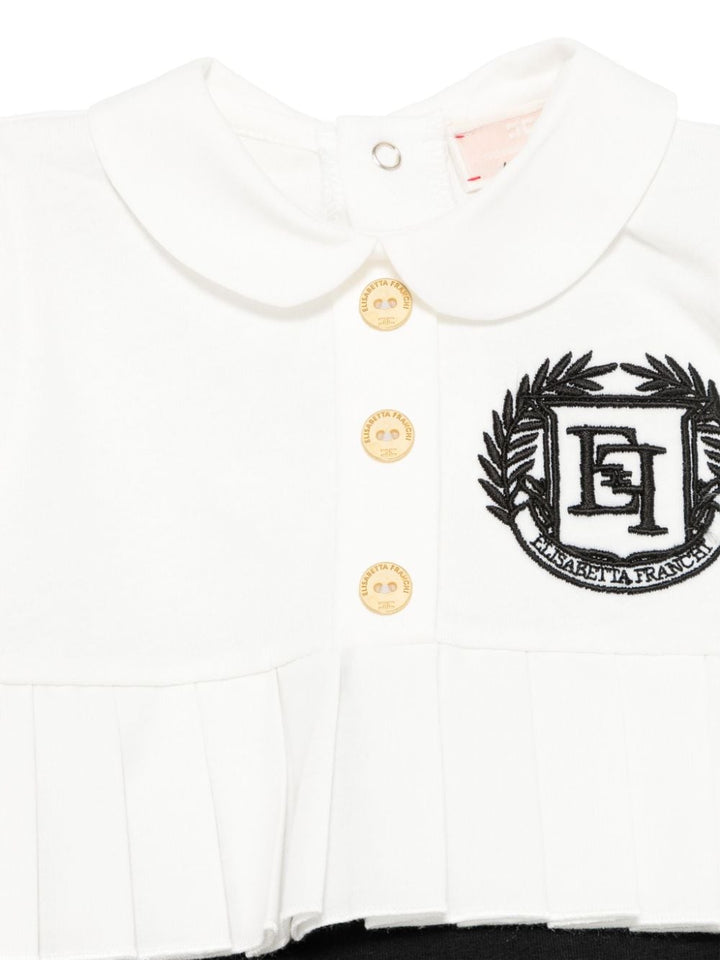 Black/white baby romper with logo