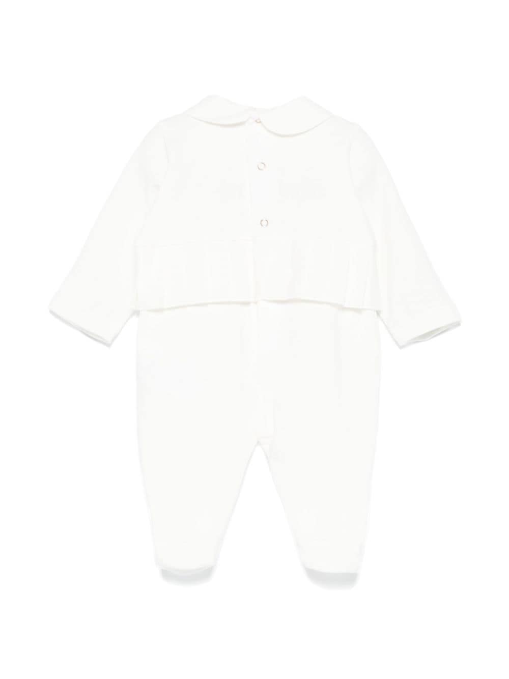 White baby girl onesie with logo