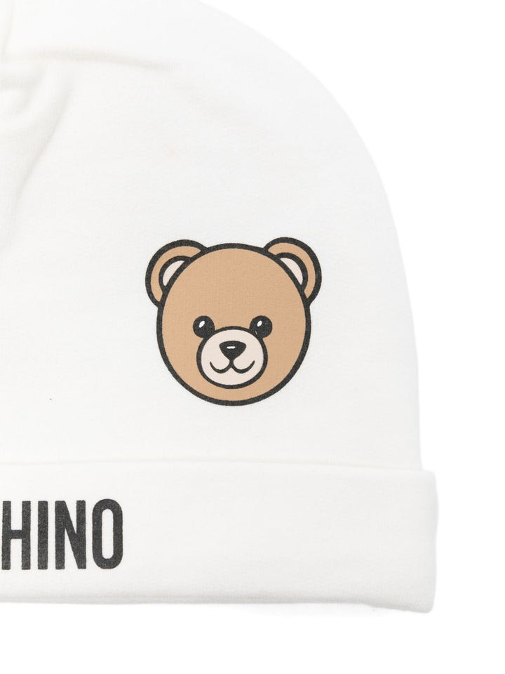 Cappello bianco per neonato MUX05LLCA40 10063 Moschino Kids 