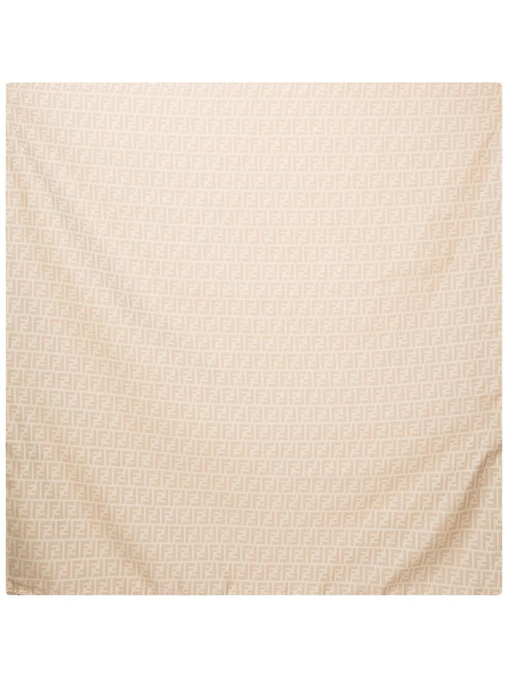 Beige and white blanket with logo