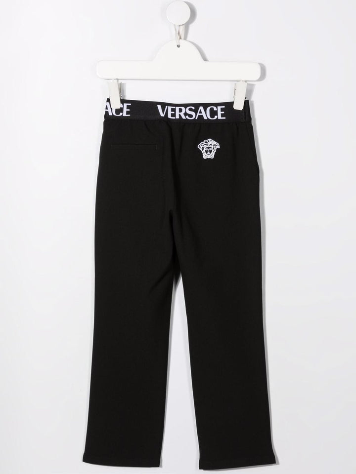 Black trousers for girls with logo