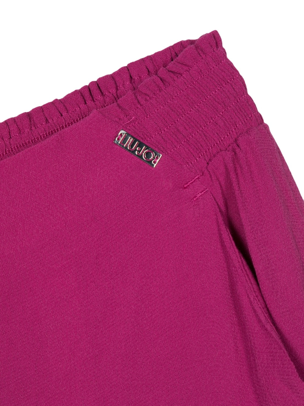 Fuchsia trousers for girls