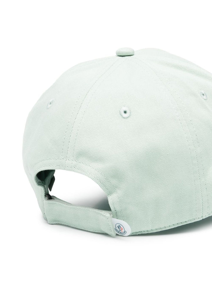 Green hat for children with logo