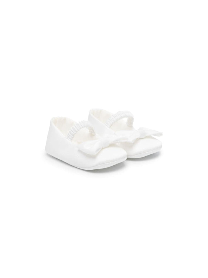 Scarpe bianche per neonata con fiocco