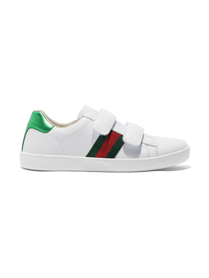 White sneakers for children with logo
