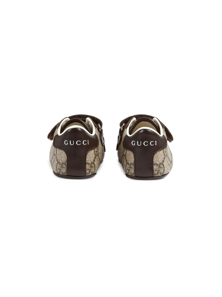 Brown sneakers for newborns with logo