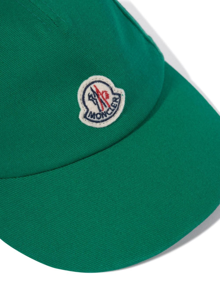 Green baby hat with logo