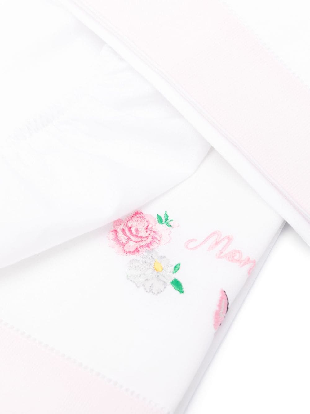 Lenzuola bianca e rosa per neonata
