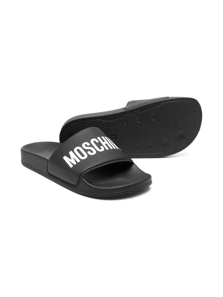 Ciabatte nere per bambini con logo 77490 8 Moschino Kids 