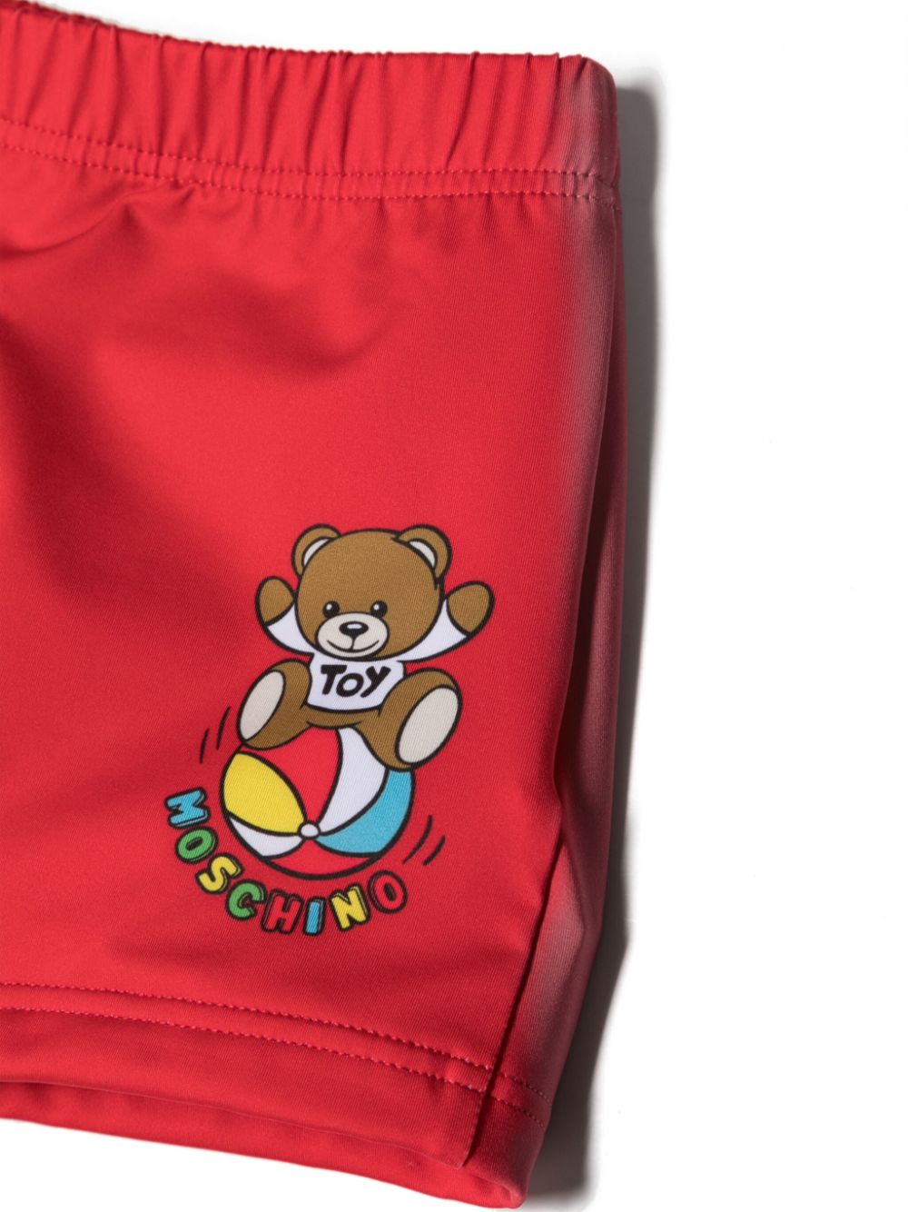 Red baby swim shorts with logo