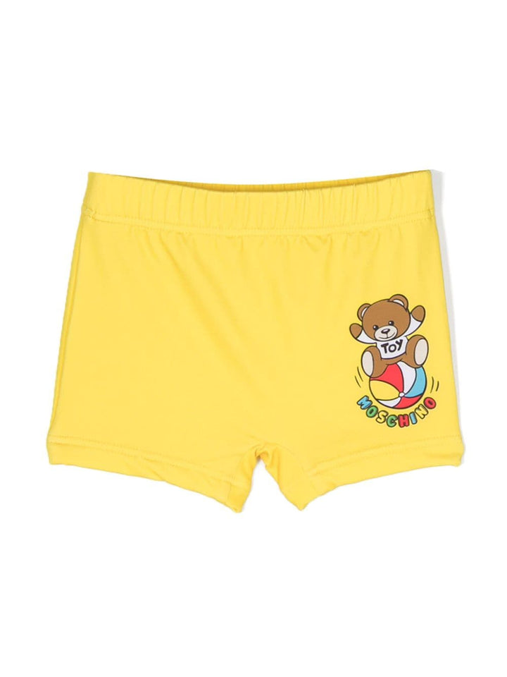 Yellow baby swim shorts with logo