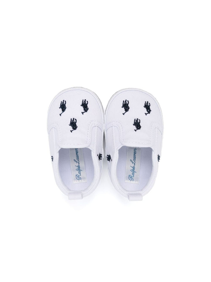 White sneakers for newborns with all-over logo