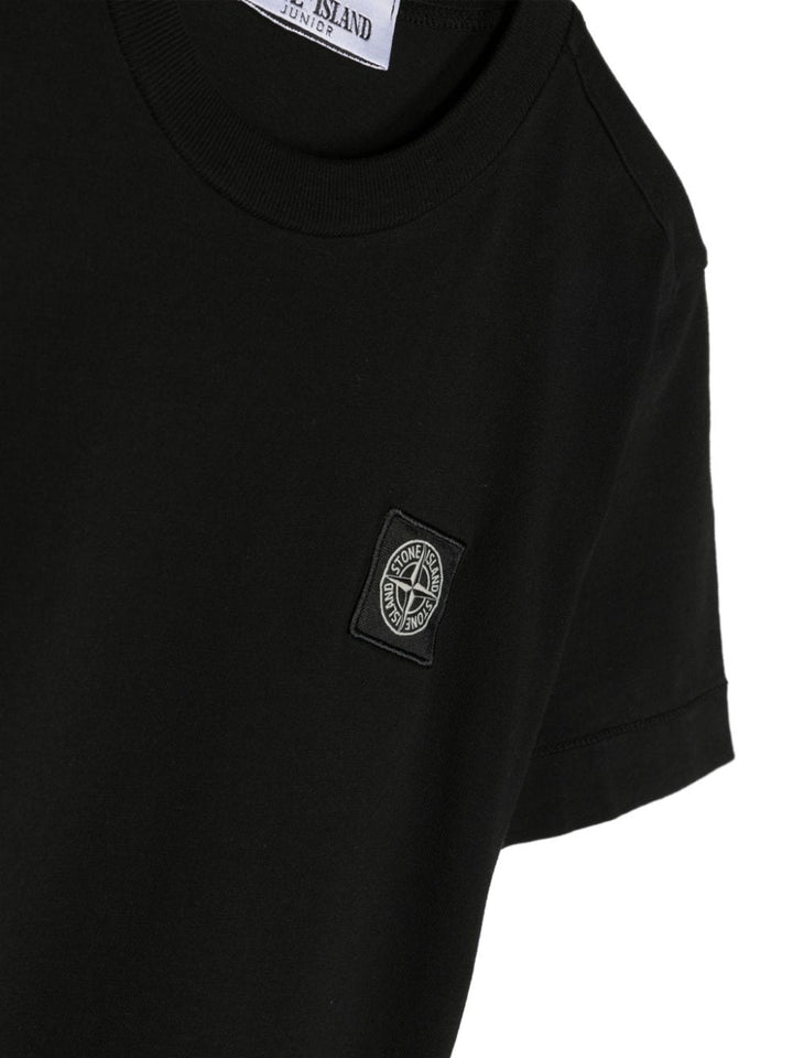 T-shirt nera per bambino con logo 801620147 V0029 Stone Island Kids 