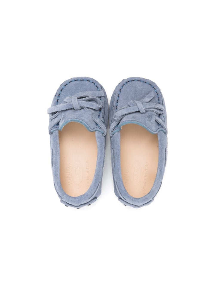 Pastel blue moccasins for newborns in suede