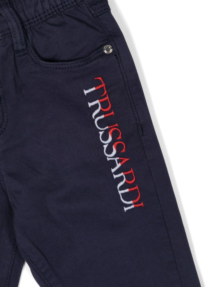 Blue baby trousers with logo