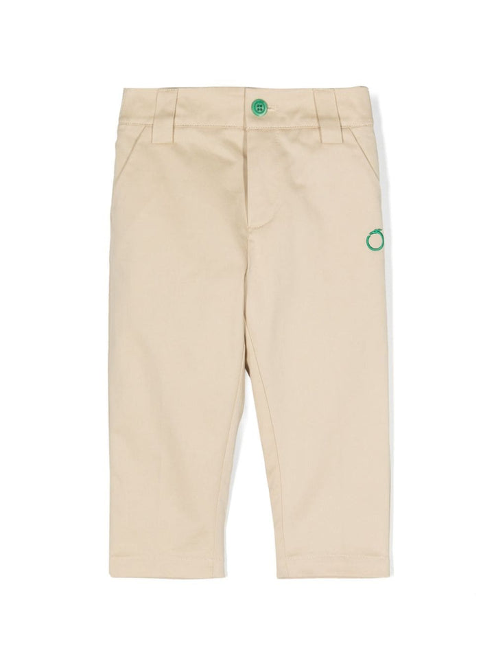 Beige baby trousers with green logo