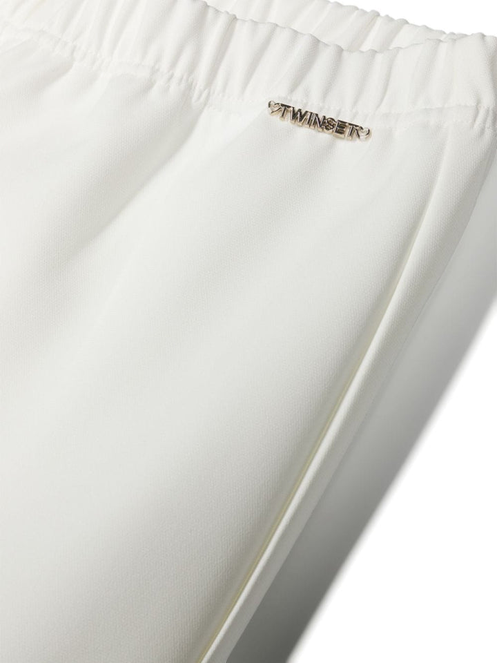 White trousers for girls with logo