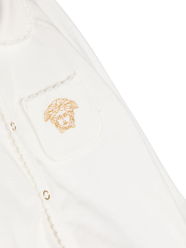 White baby onesie with logo