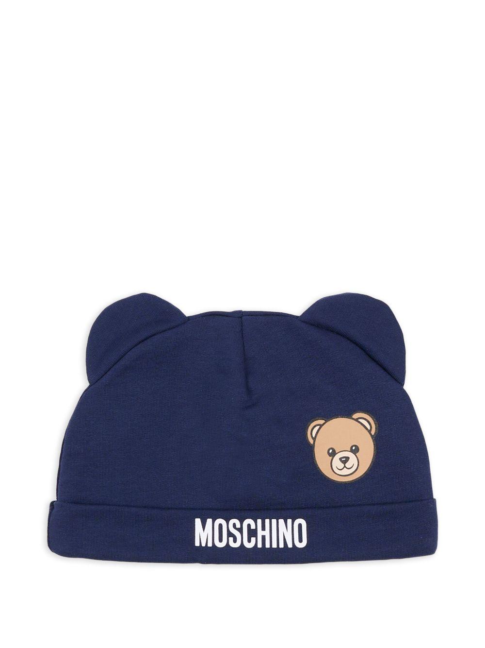 Kit cappello/bavetta blu navy per neonato MUY099LCA19 40016 Moschino Kids 