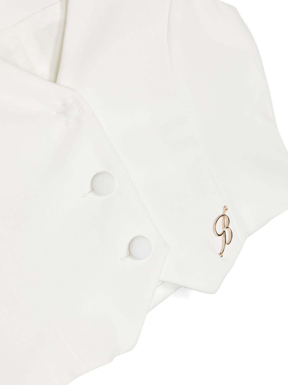 White vest for girls with logo plaque