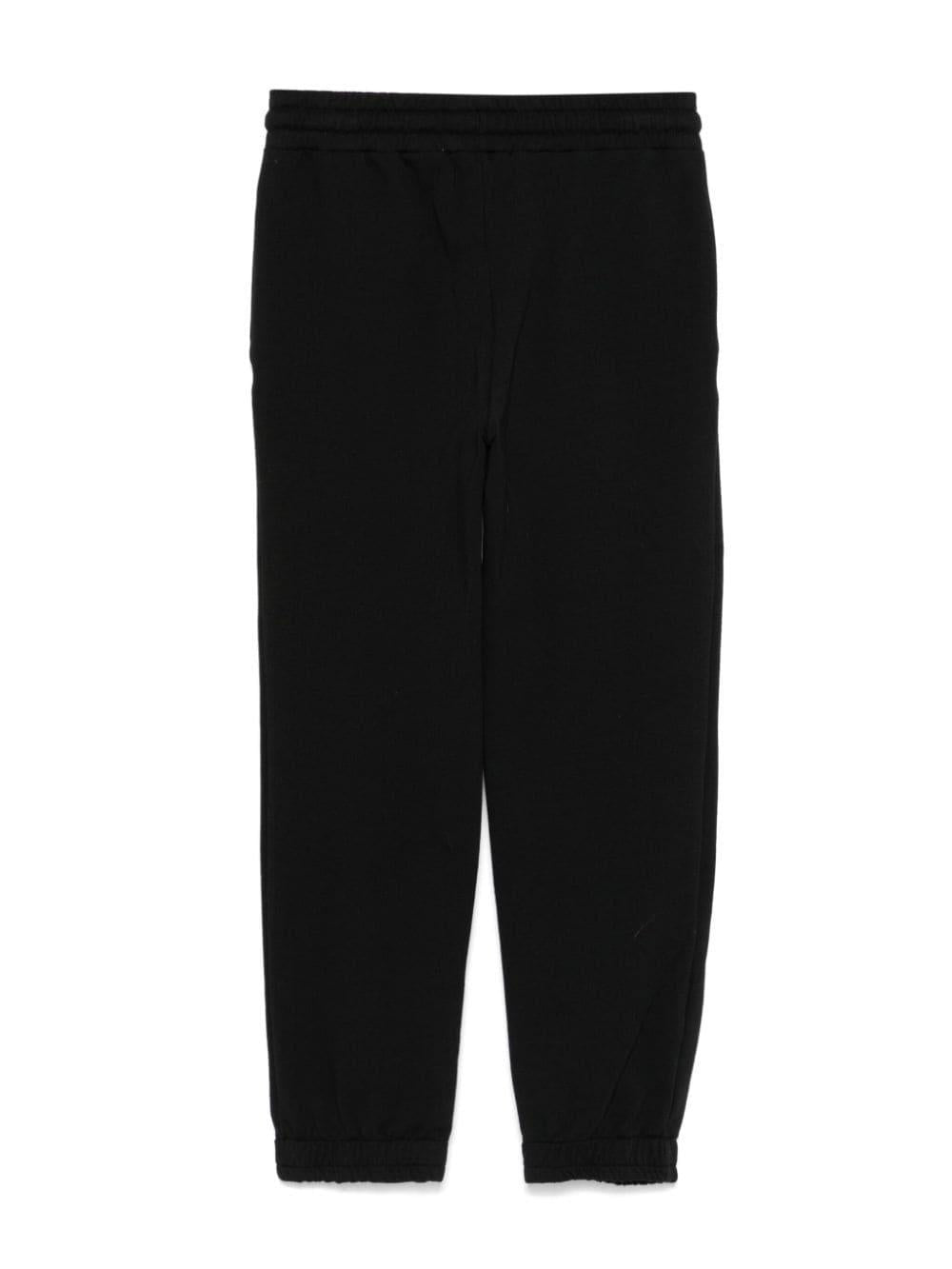 Black trousers for girls with logo