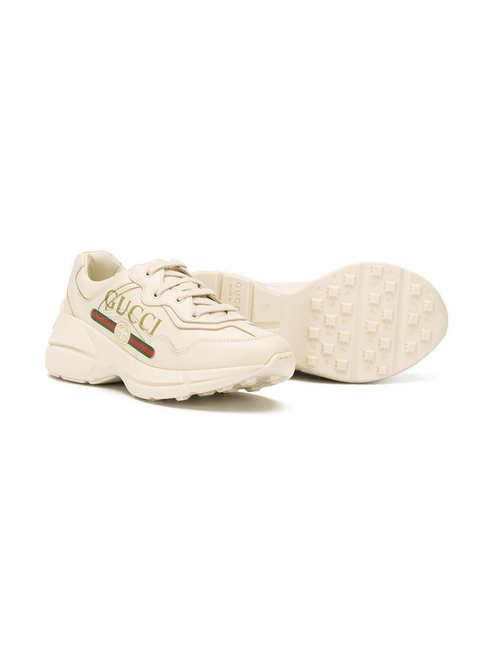 Sneakers crema per bambina con logo