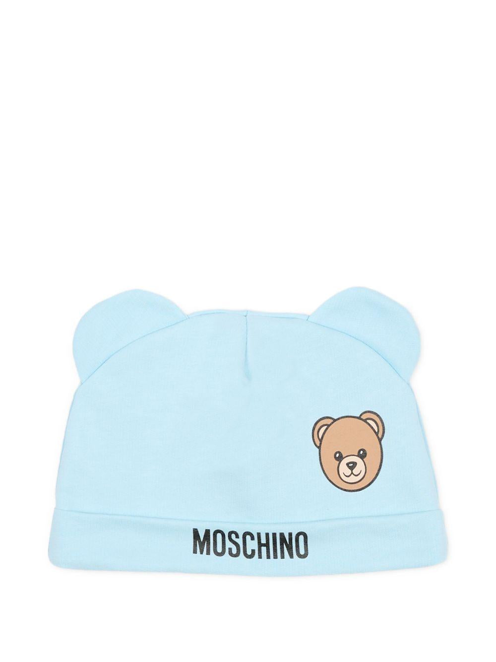 Kit cappello/bavetta azzurro per neonato MUY099LCA19 40304 Moschino Kids 