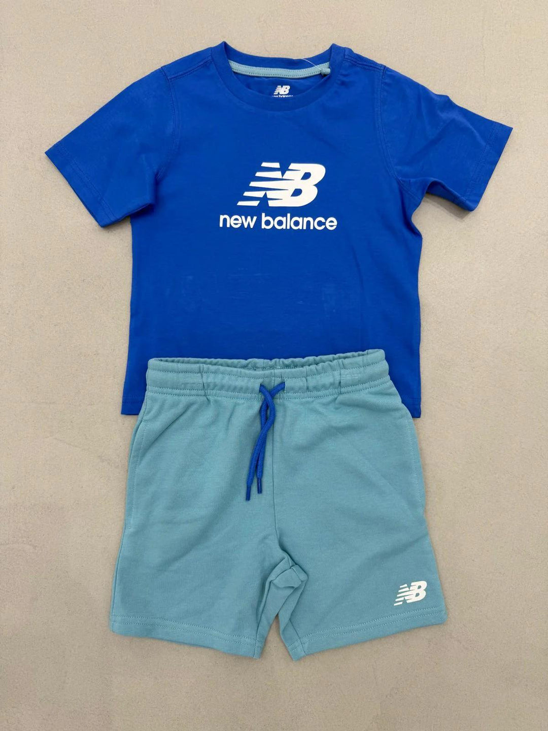 Completo blu elettrico per bambino YS61Z4H1 AA2 New Balance Kids 