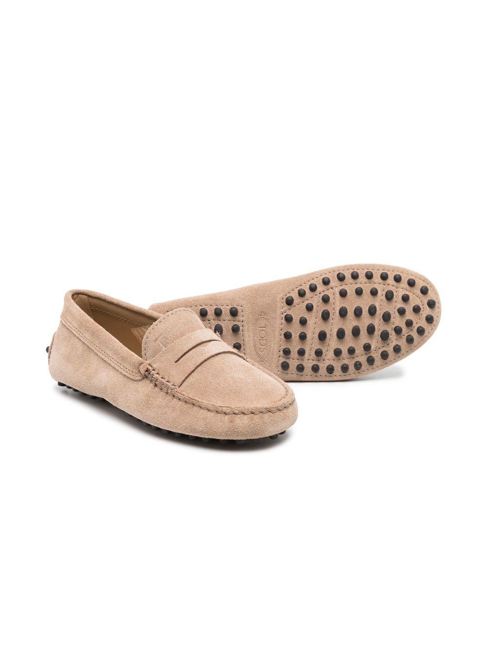 Beige leather moccasins for children