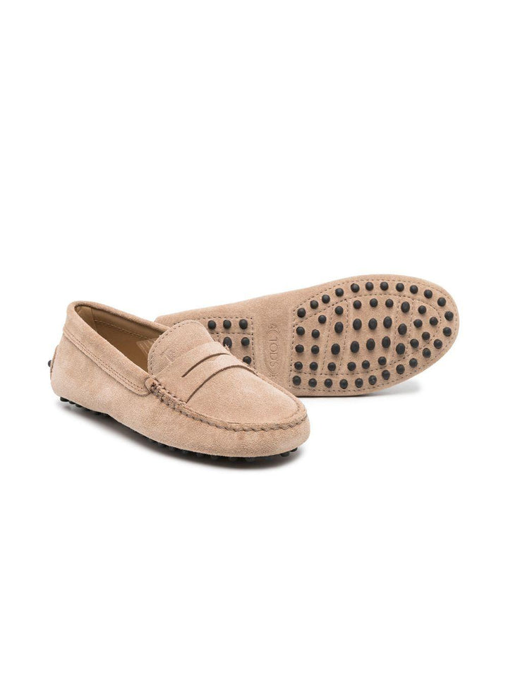 Beige leather moccasins for children