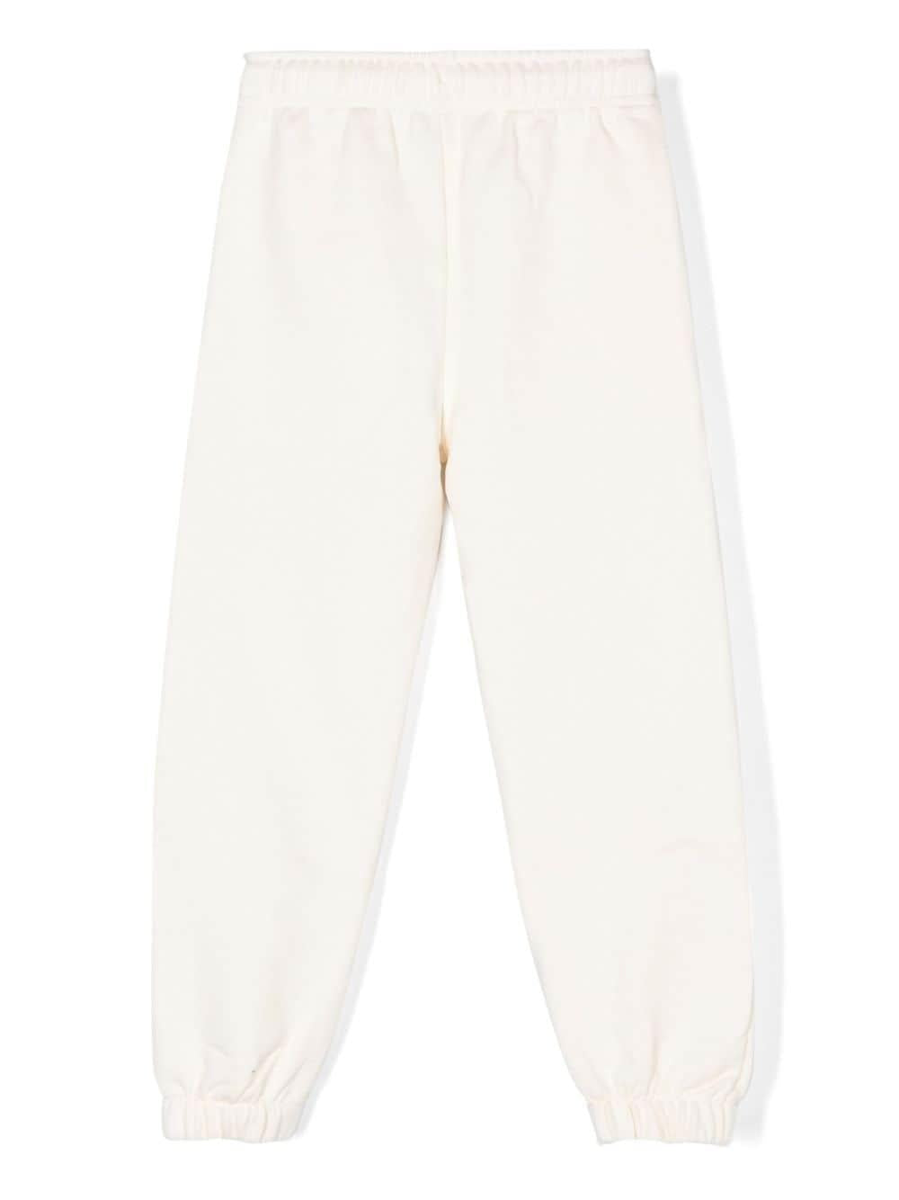 White cotton trousers for children