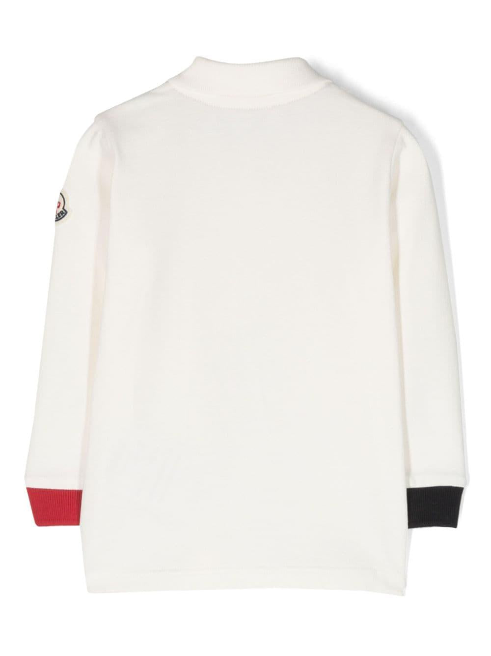 White polo shirt for newborns with logo