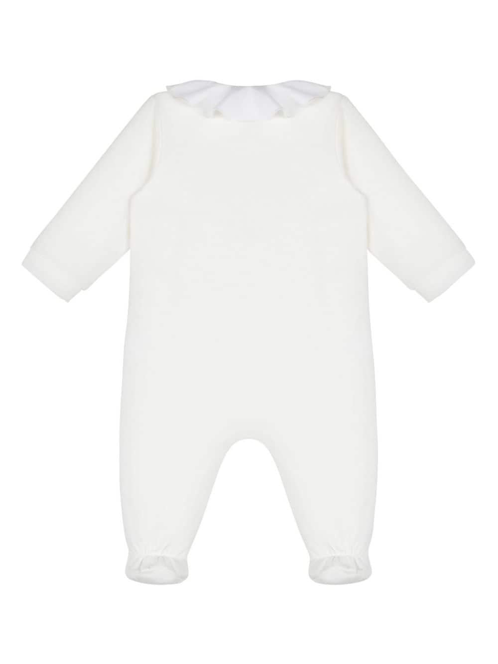 White baby onesie with logo