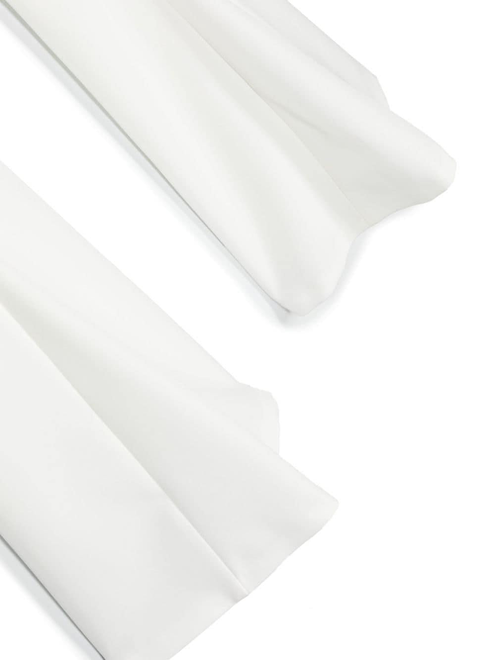 White trousers for girls with logo plaque