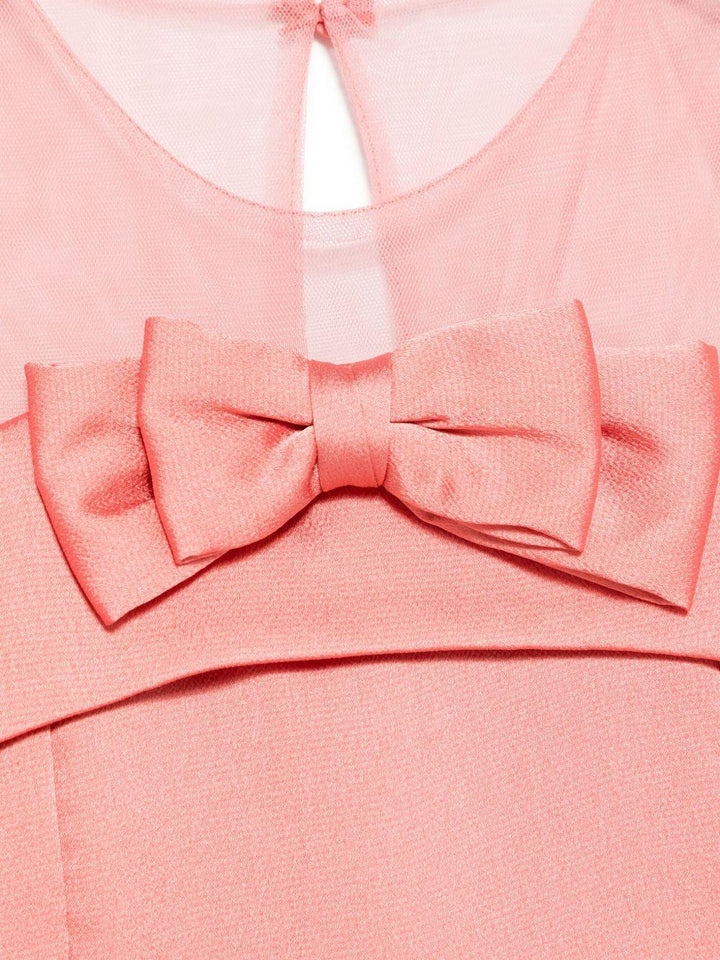 Tuta rosa salmone per bambina