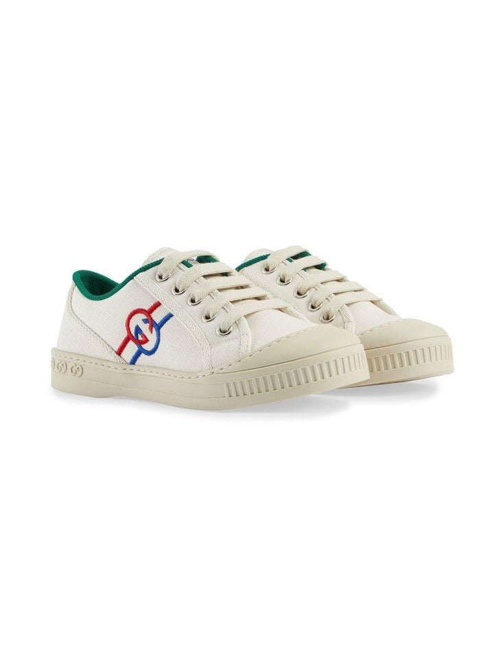 White sneakers for children with logo