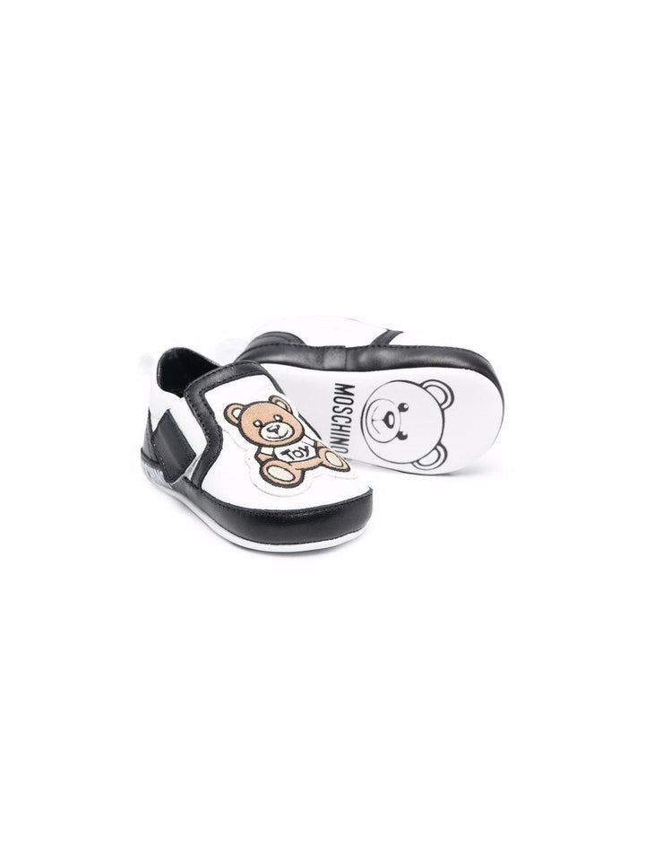 Black and white leather baby shoes