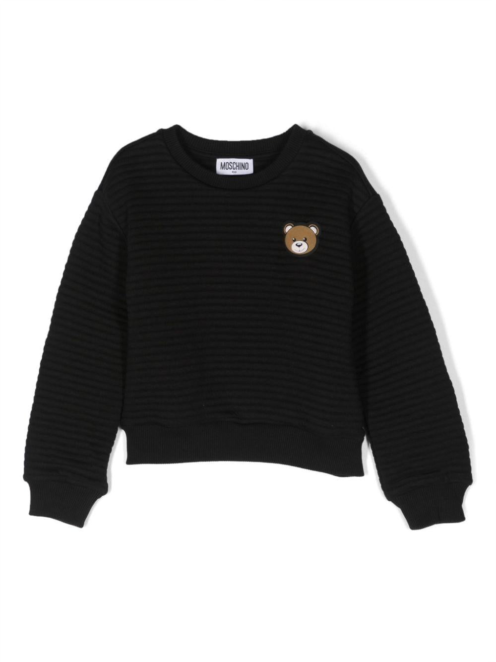 Felpa nera per bambina con logo HUF07JLIA16 60100 Moschino Kids 