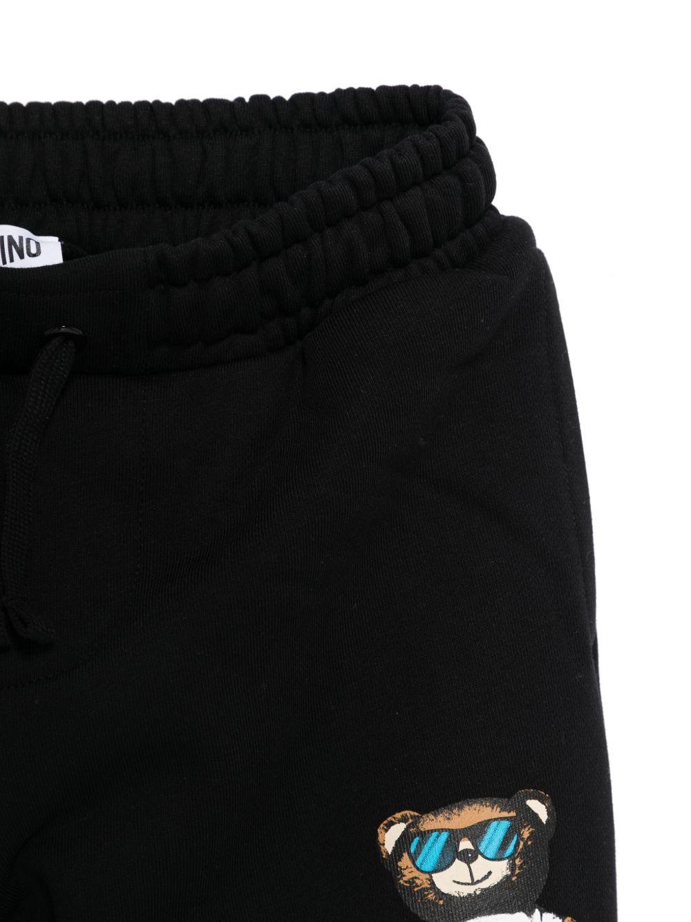 Completo sportivo bianco/nero per bambino