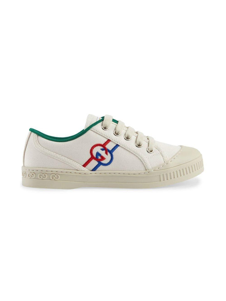 White sneakers for children with logo