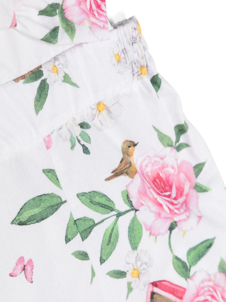 White dungarees for baby girls with flowers
