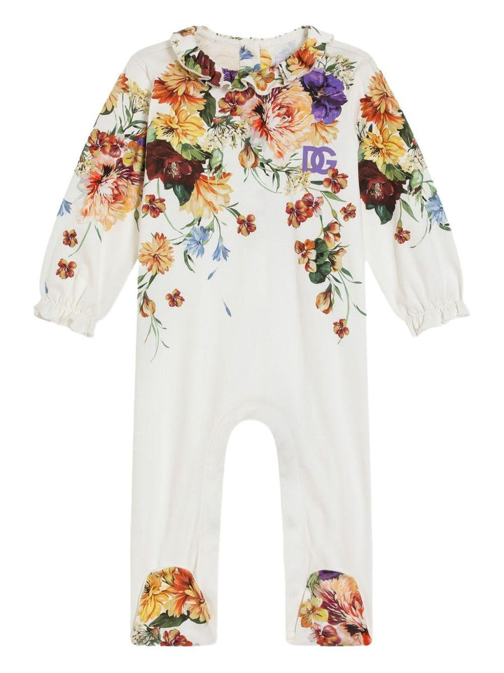 Tutina bianca con fiori per neonata
